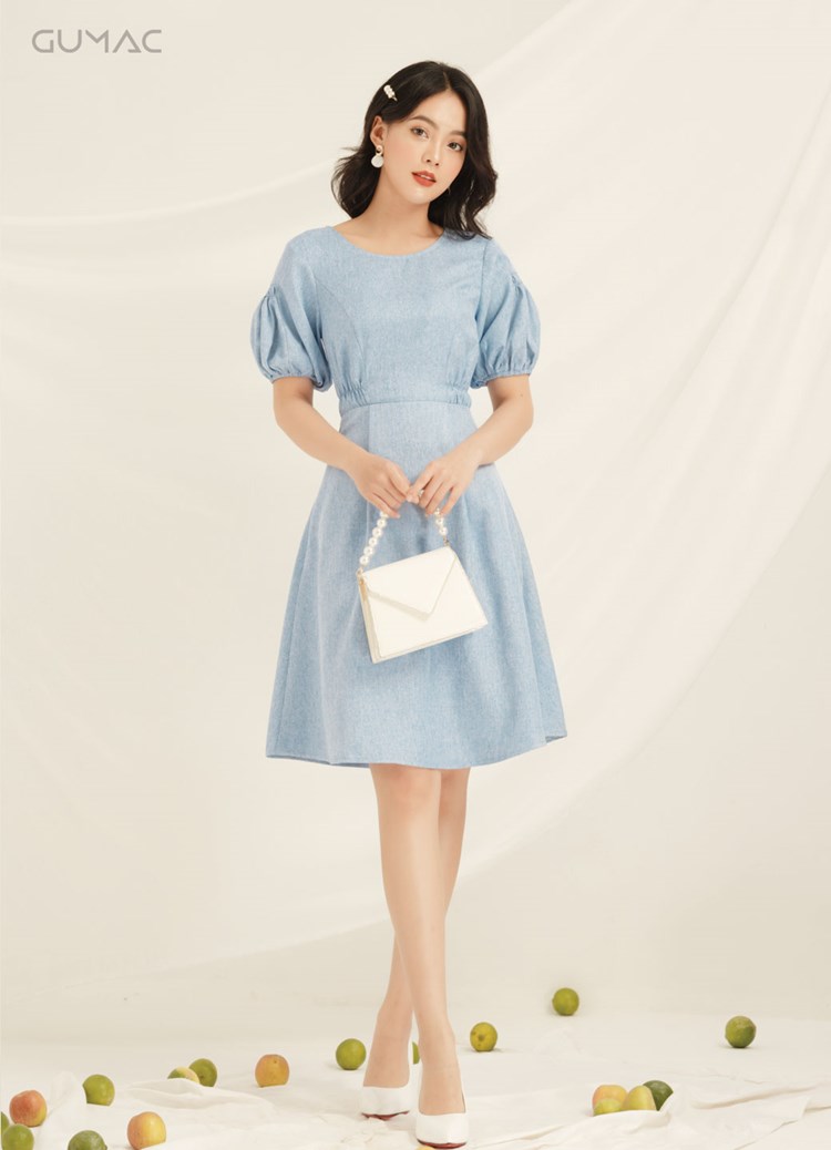 túi da PU màu trắng phối đầm xanh ngọc